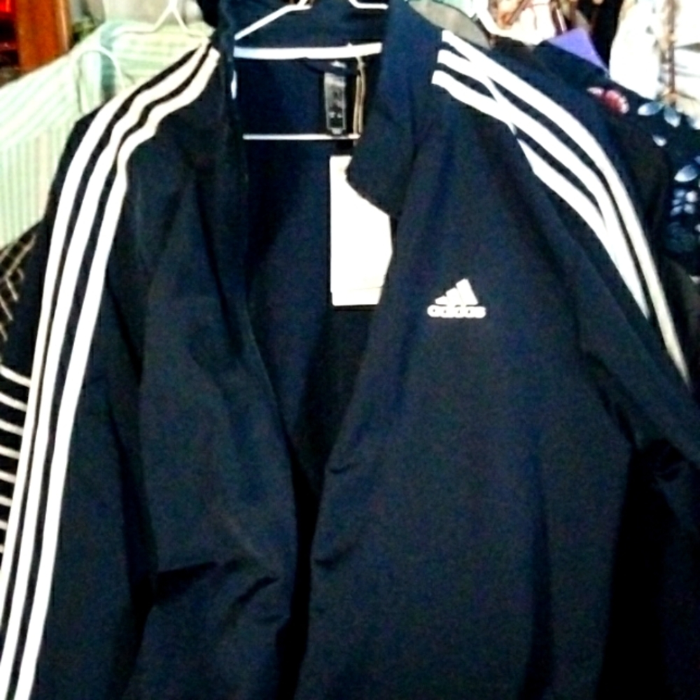 Adidas men's lightweight jacket for Jim or anywhere Beach looks wonderful